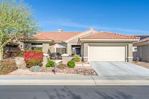 front view of a house with a patio