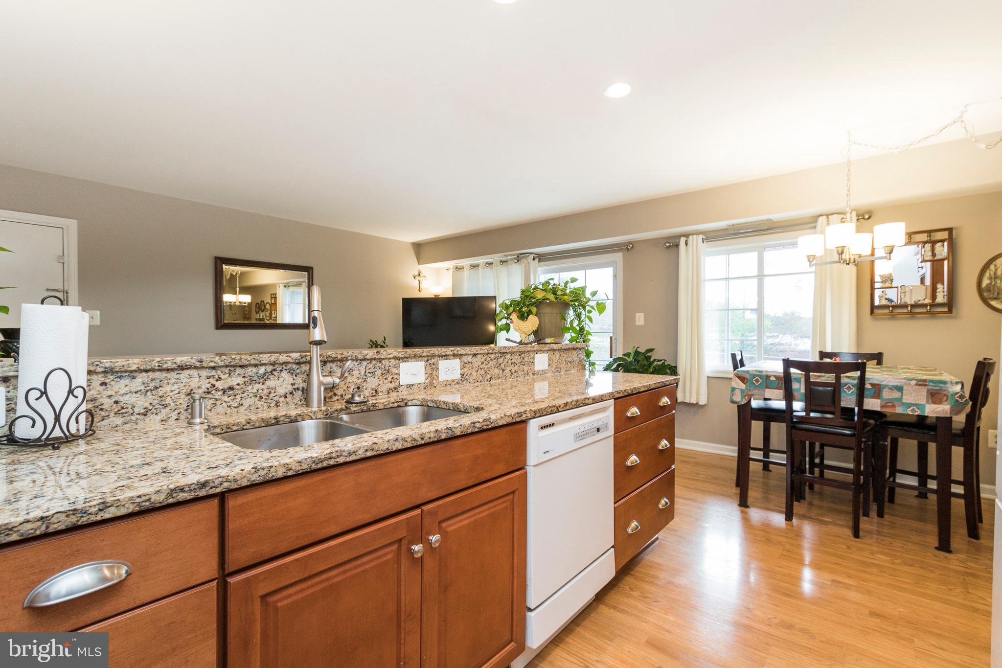 631 Waterloo Road, Unit 131 Warrenton, VA 20186 - Photo 13 of 23 Gourmet Kitchen Opens to Dining Room