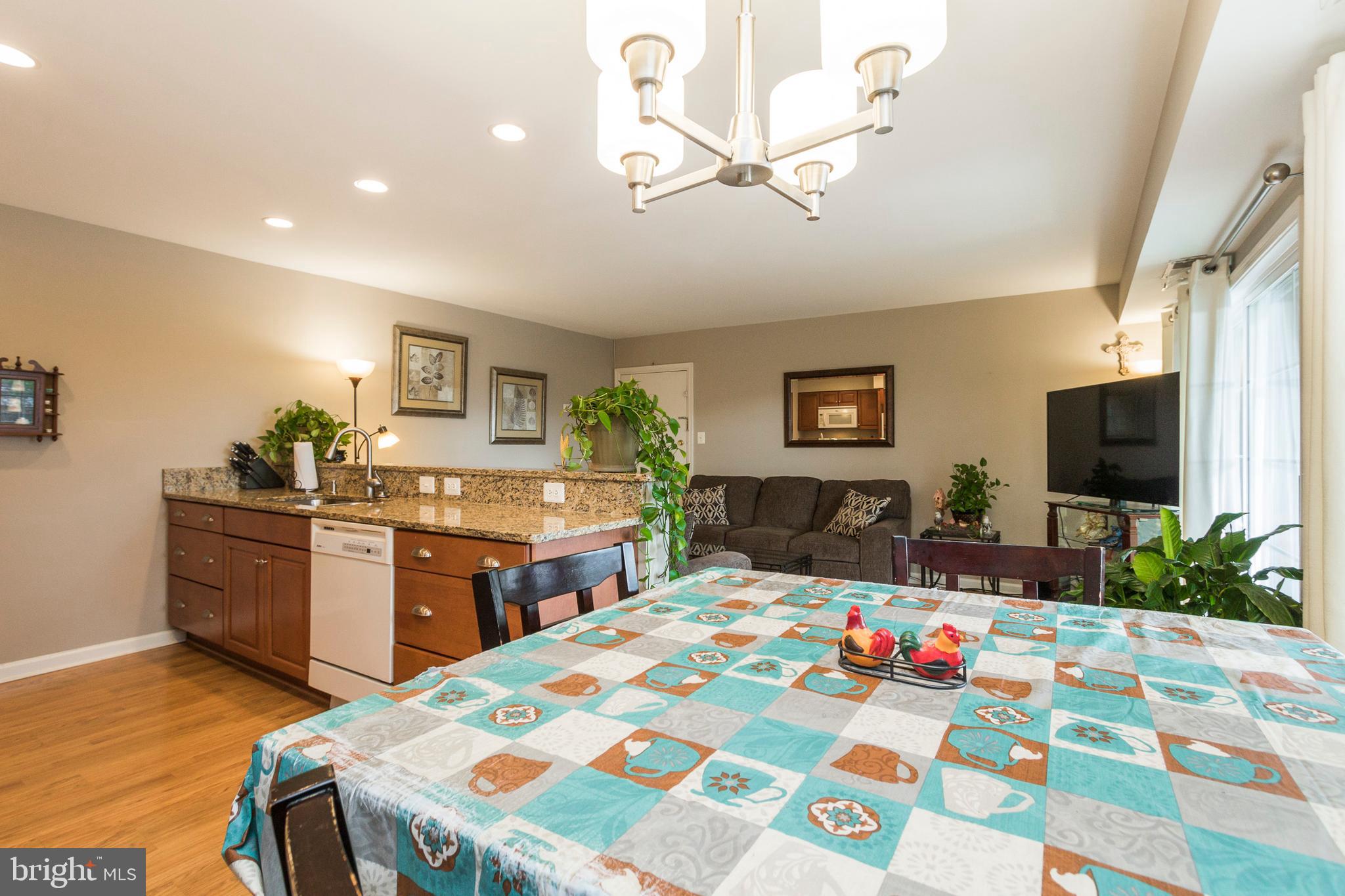 631 Waterloo Road, Unit 131 Warrenton, VA 20186 - Photo 14 of 23 Dining Room Opens to Gourmet Kitchen