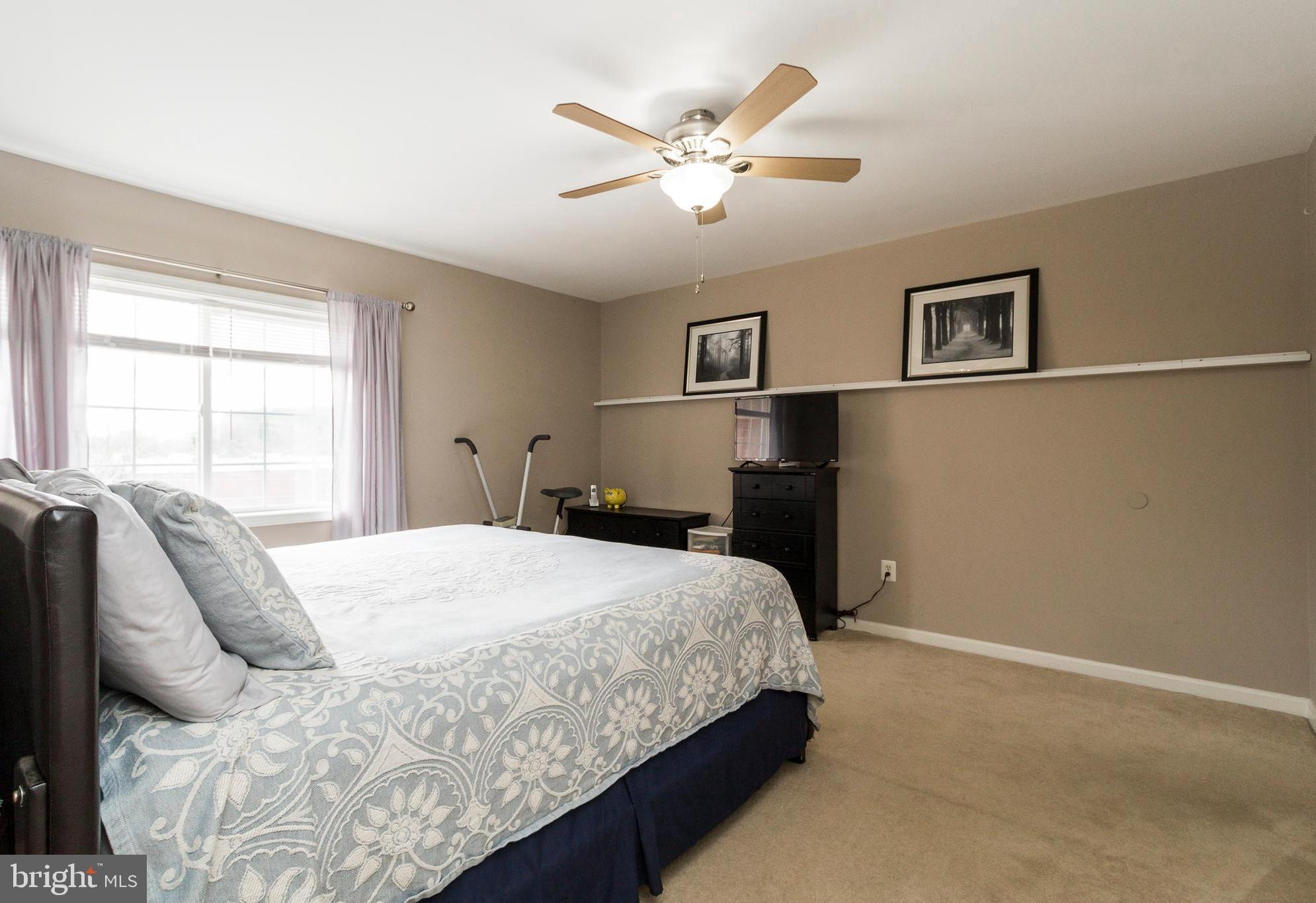 631 Waterloo Road, Unit 131 Warrenton, VA 20186 - Photo 16 of 23 Large Bedroom with Sunlit Double Window
