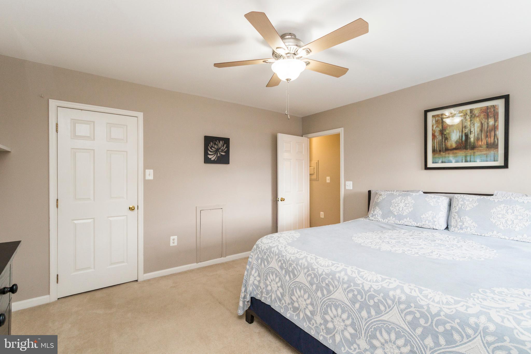 631 Waterloo Road, Unit 131 Warrenton, VA 20186 - Photo 17 of 23 Large Bedroom with Huge W/I Closet with Built-Ins
