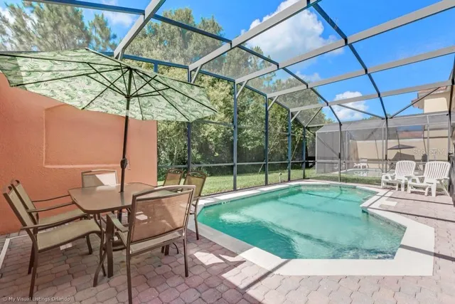 a view of yard with outdoor seating