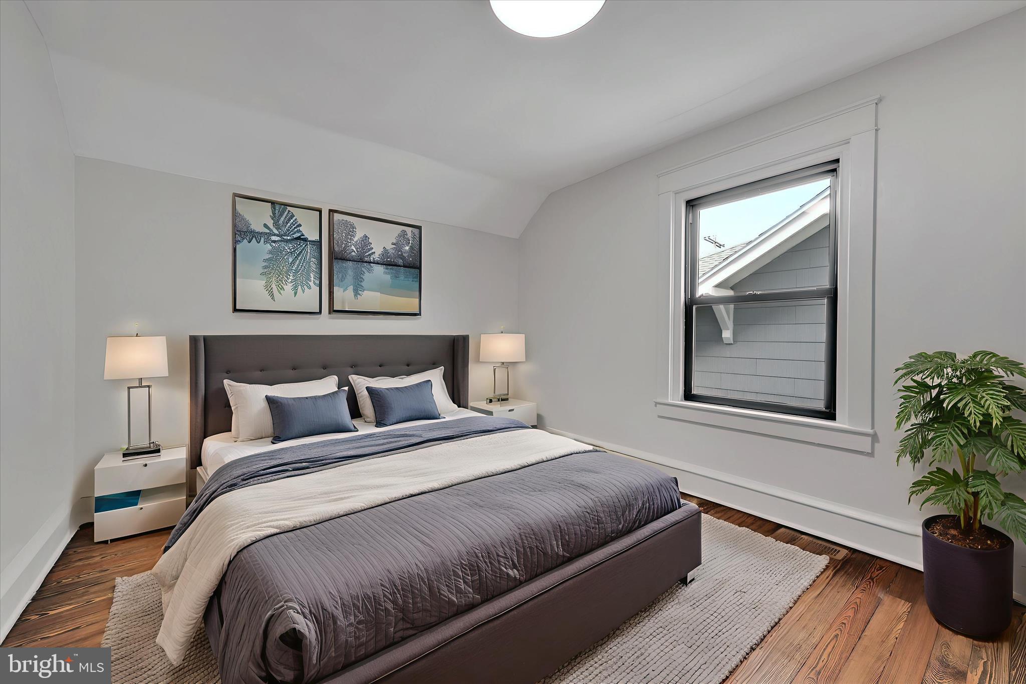149 Tulpehocken Avenue Reading, PA 19611 - Photo 21 of 44 a bedroom with bed and a potted plant