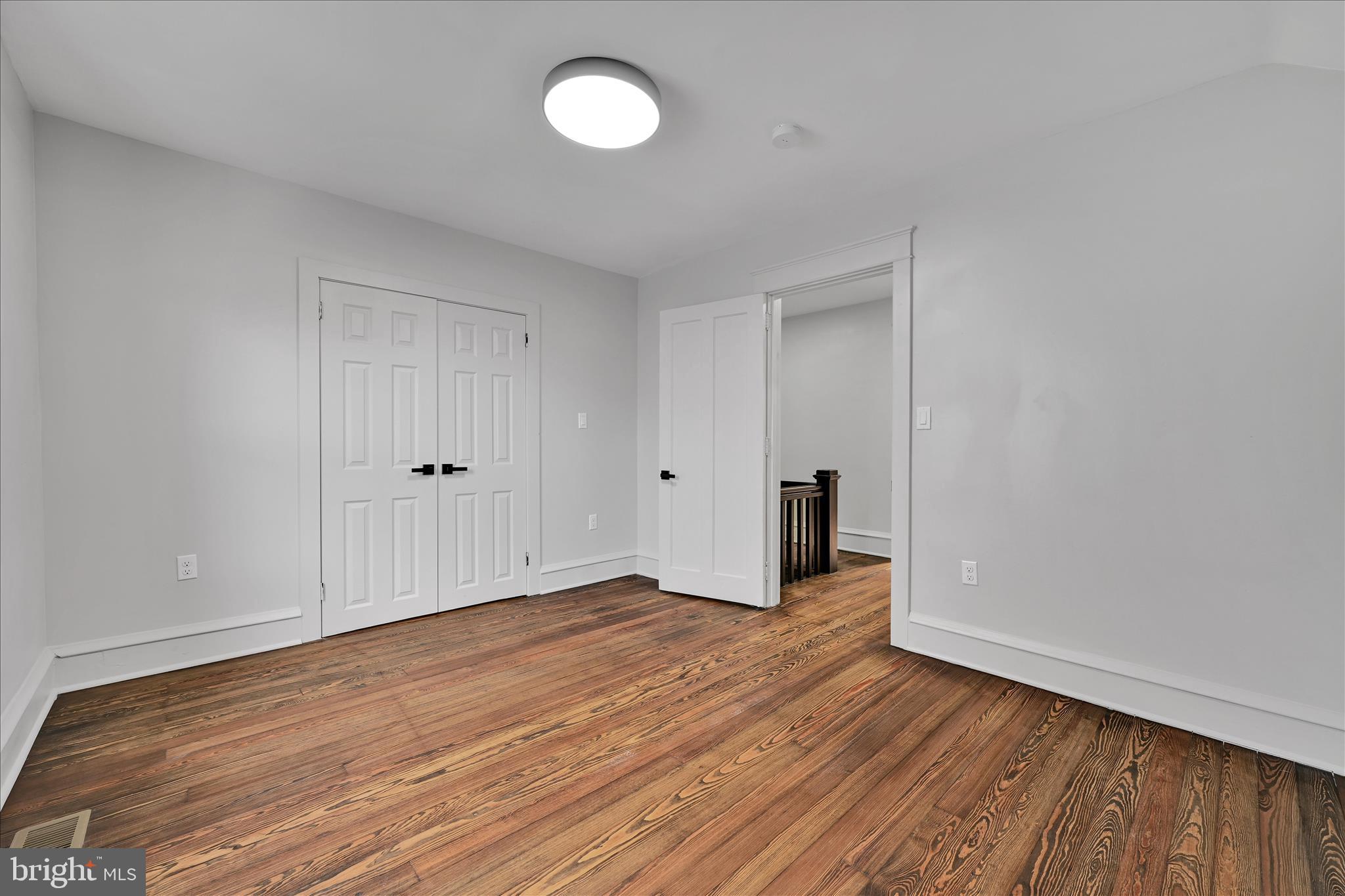 149 Tulpehocken Avenue Reading, PA 19611 - Photo 23 of 44 a view of an empty room with wooden floor