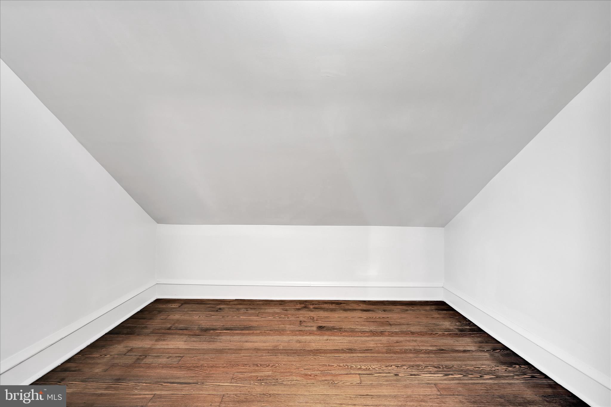 149 Tulpehocken Avenue Reading, PA 19611 - Photo 24 of 44 a view of an empty room with wooden floor