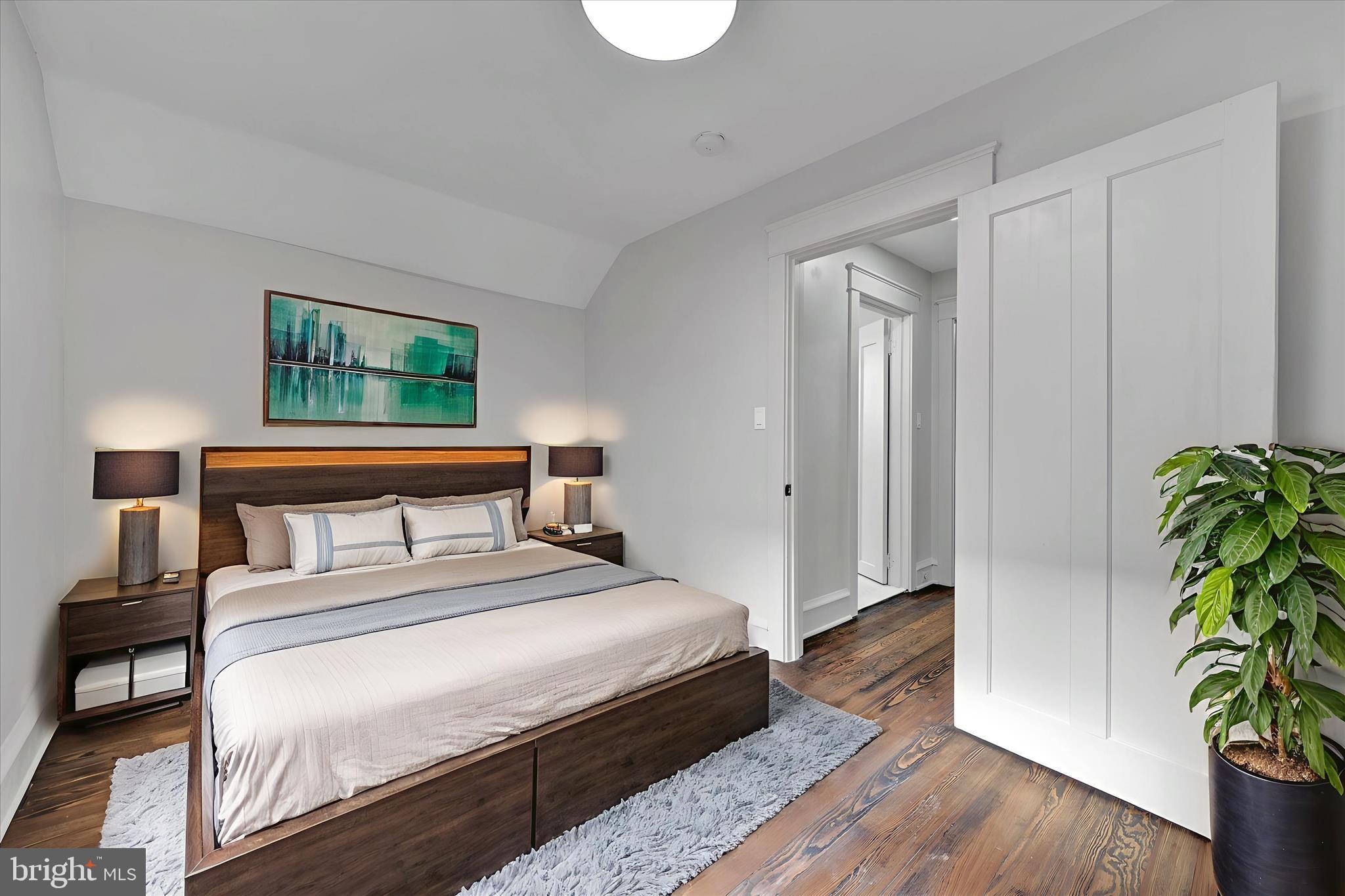 149 Tulpehocken Avenue Reading, PA 19611 - Photo 27 of 44 a bedroom with a bed and a potted plant