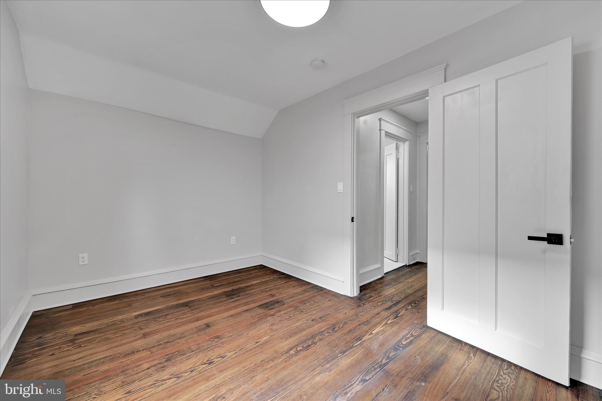149 Tulpehocken Avenue Reading, PA 19611 - Photo 28 of 44 a view of an empty room with wooden floor