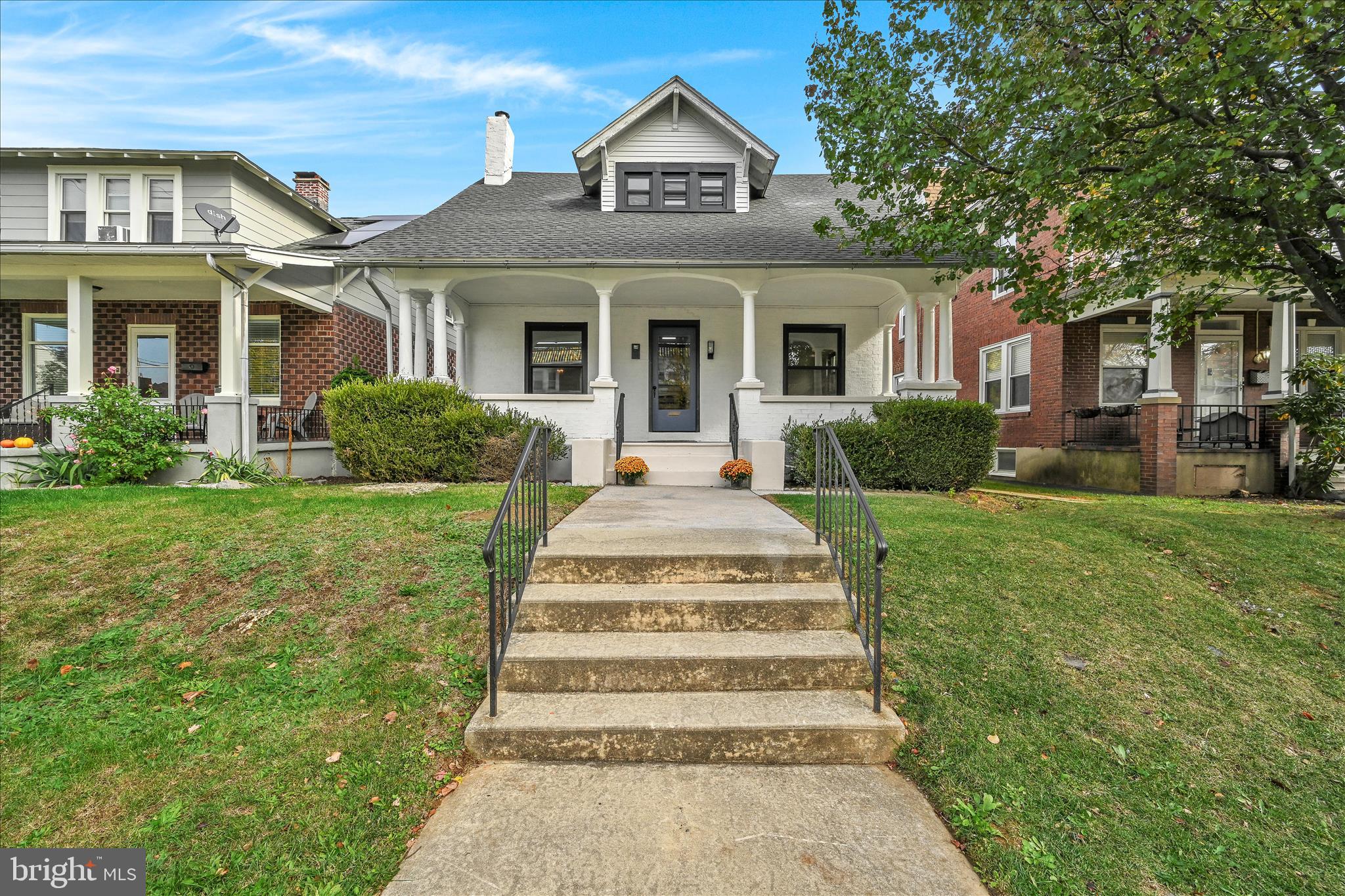 149 Tulpehocken Avenue Reading, PA 19611 - Photo 3 of 44 a front view of a house with a yard