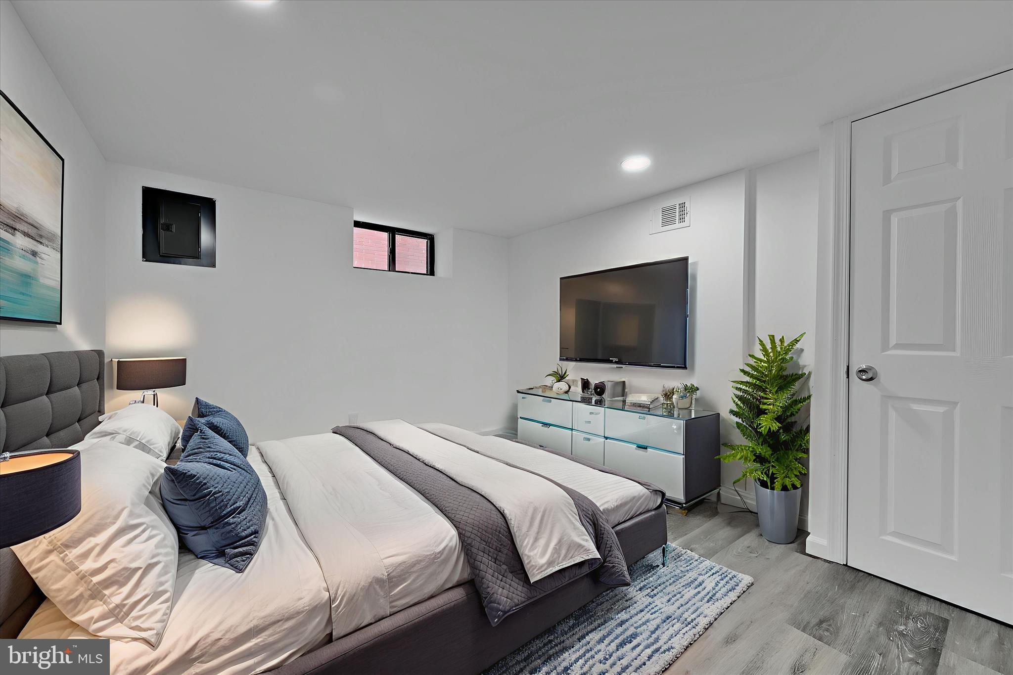 149 Tulpehocken Avenue Reading, PA 19611 - Photo 34 of 44 a bedroom with a bed and a flat screen tv