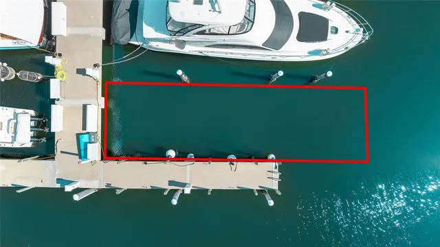 a view of residential house with outdoor space and lake view