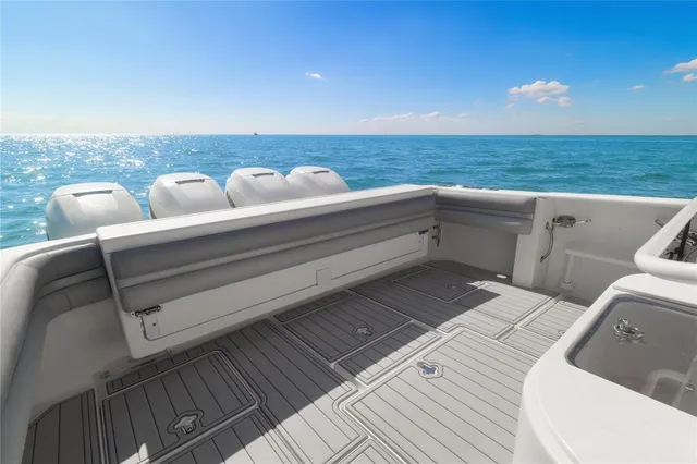 a view of roof deck with chair and wooden floor