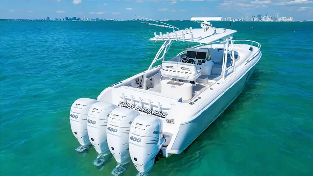 a view of a big room with a big yard and large trees