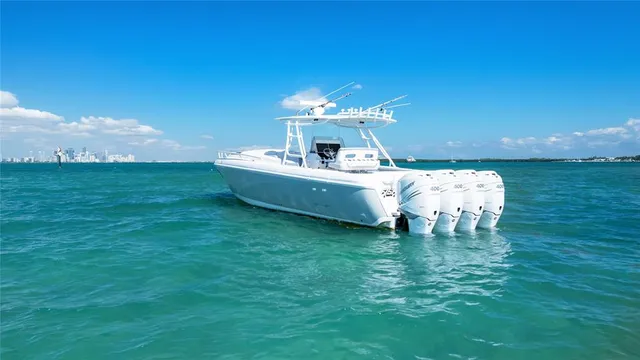 a view of a backyard with a table and chairs