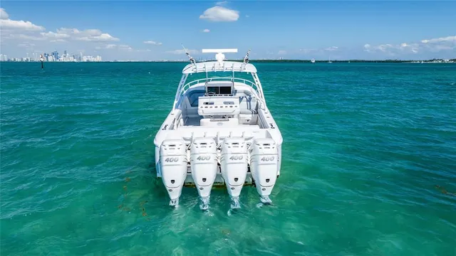 a view of a swimming pool with a yard