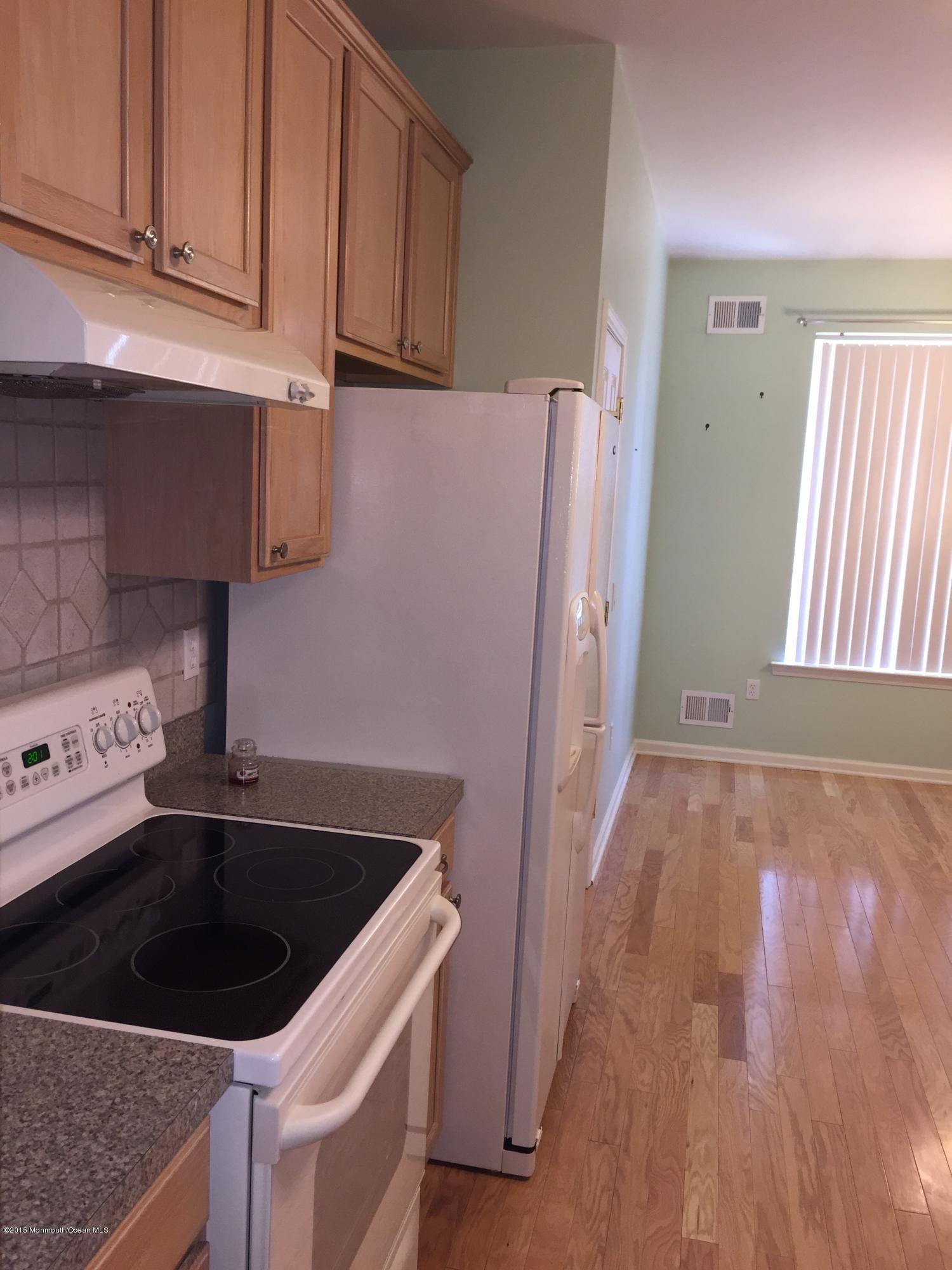 5 Springdale Road Whiting, NJ 08759 - Photo 6 of 11 a kitchen with a sink a stove and refrigerator