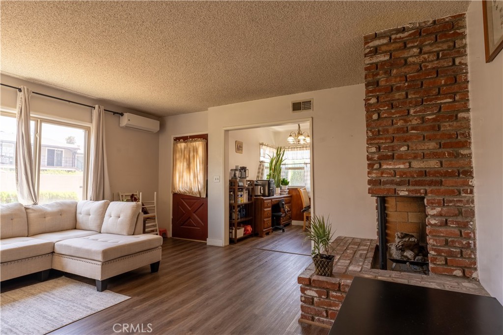 9418 East Duarte Road Arcadia, CA 91007 - Photo 6 of 21 a living room with furniture and wooden floor