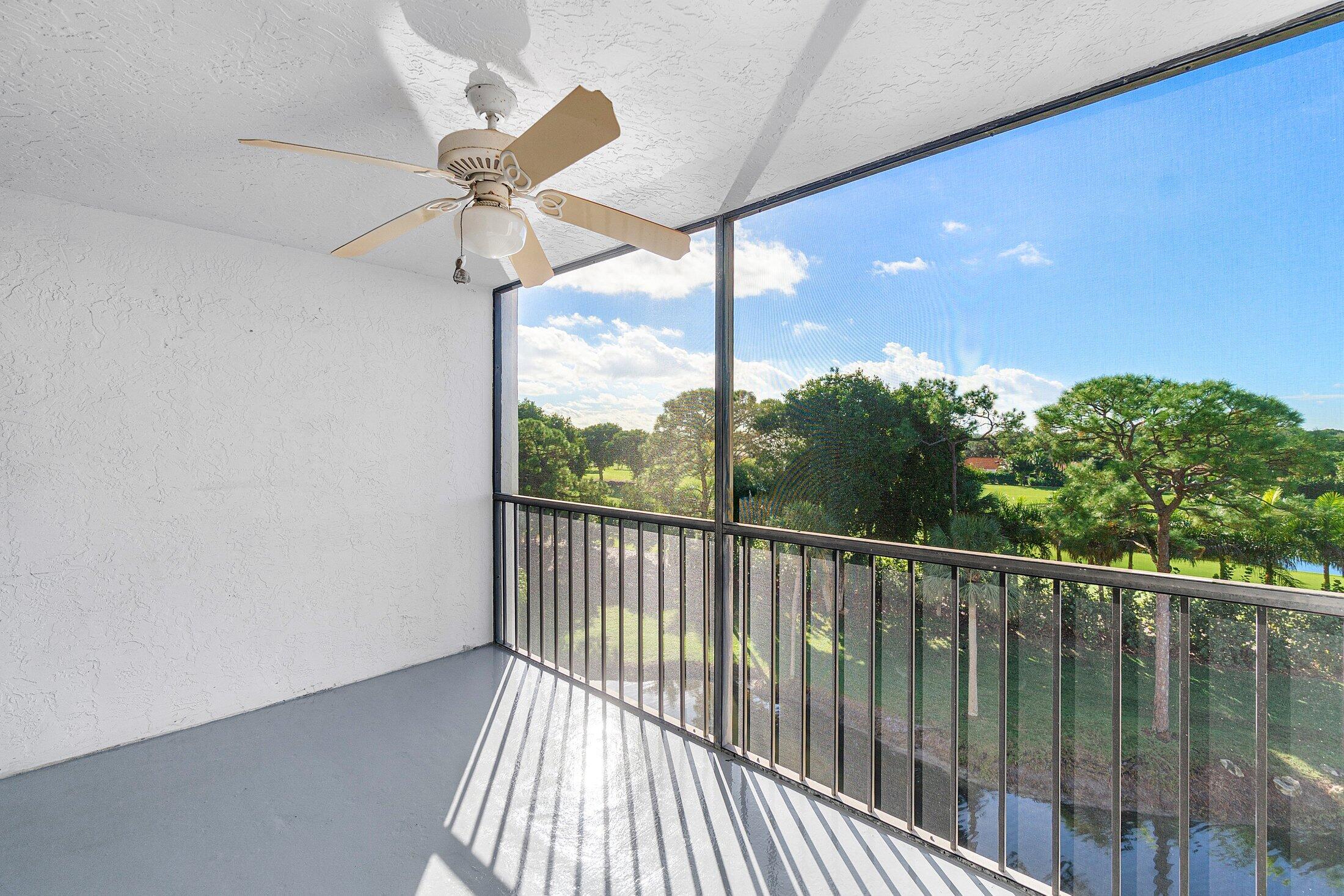 6562 Boca Del Mar Drive, Unit 527 Boca Raton, FL 33433 - Photo 24 of 38 a view of balcony with wooden floor