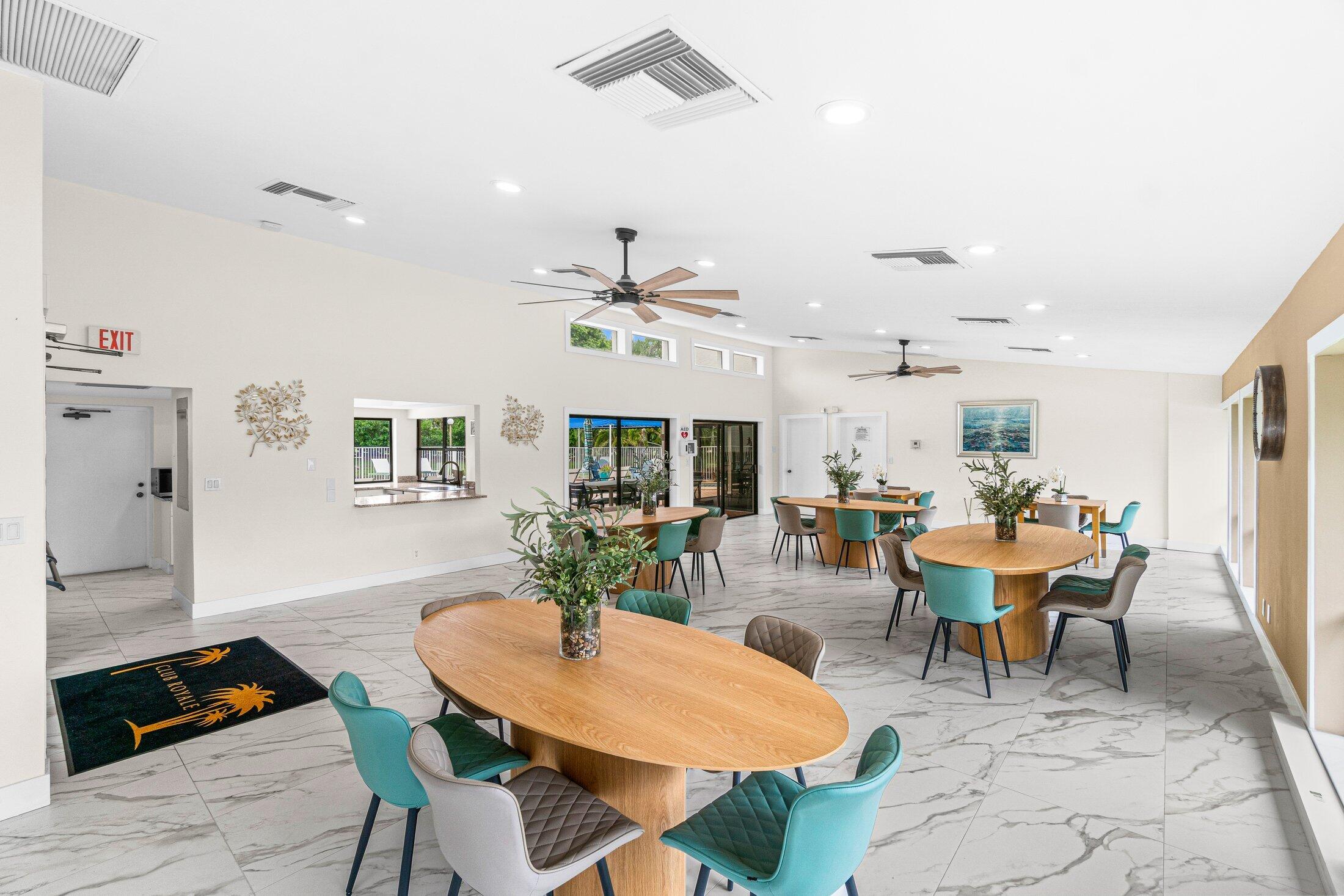 6562 Boca Del Mar Drive, Unit 527 Boca Raton, FL 33433 - Photo 34 of 38 a view of a dining room with furniture