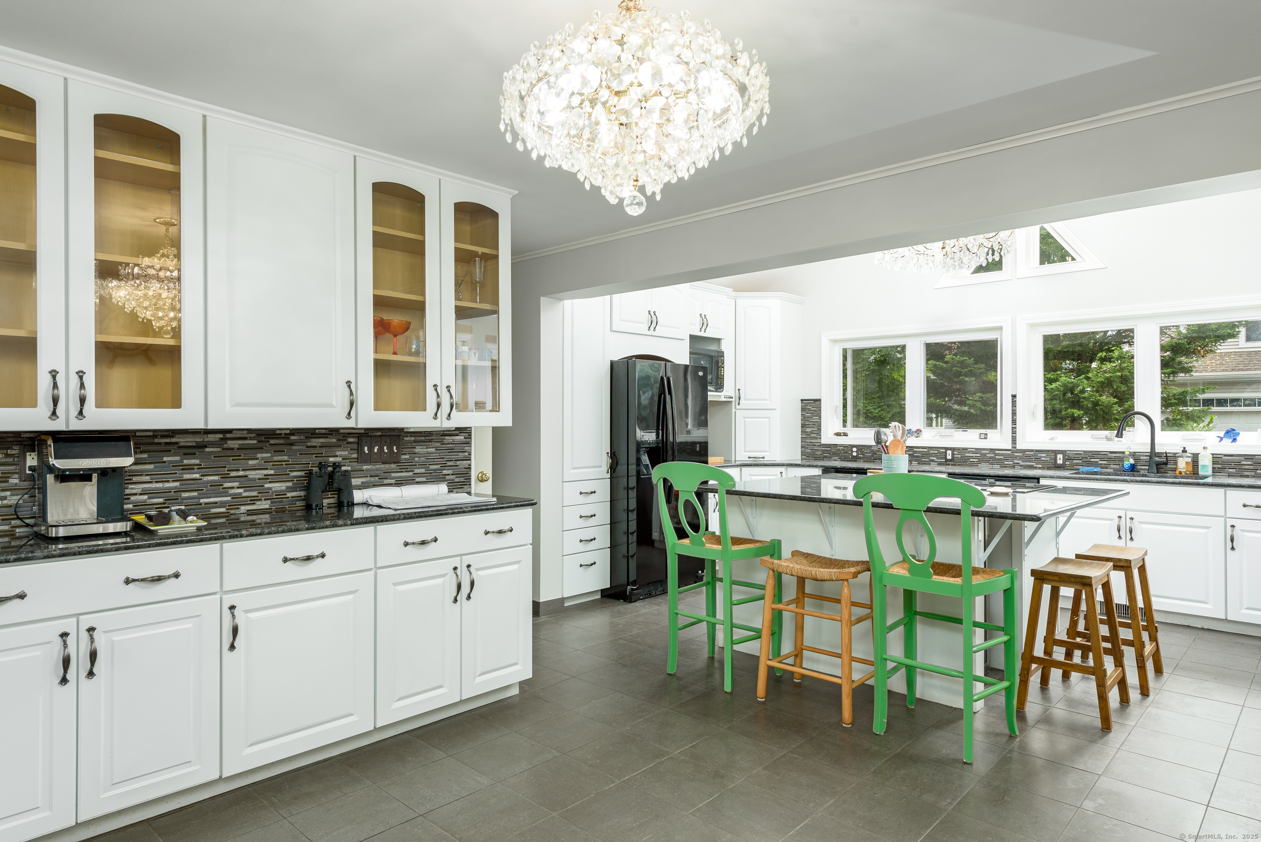 92 Grove Beach Road South Westbrook, CT 06498 - Photo 12 of 29 a kitchen with a sink and breakfast area