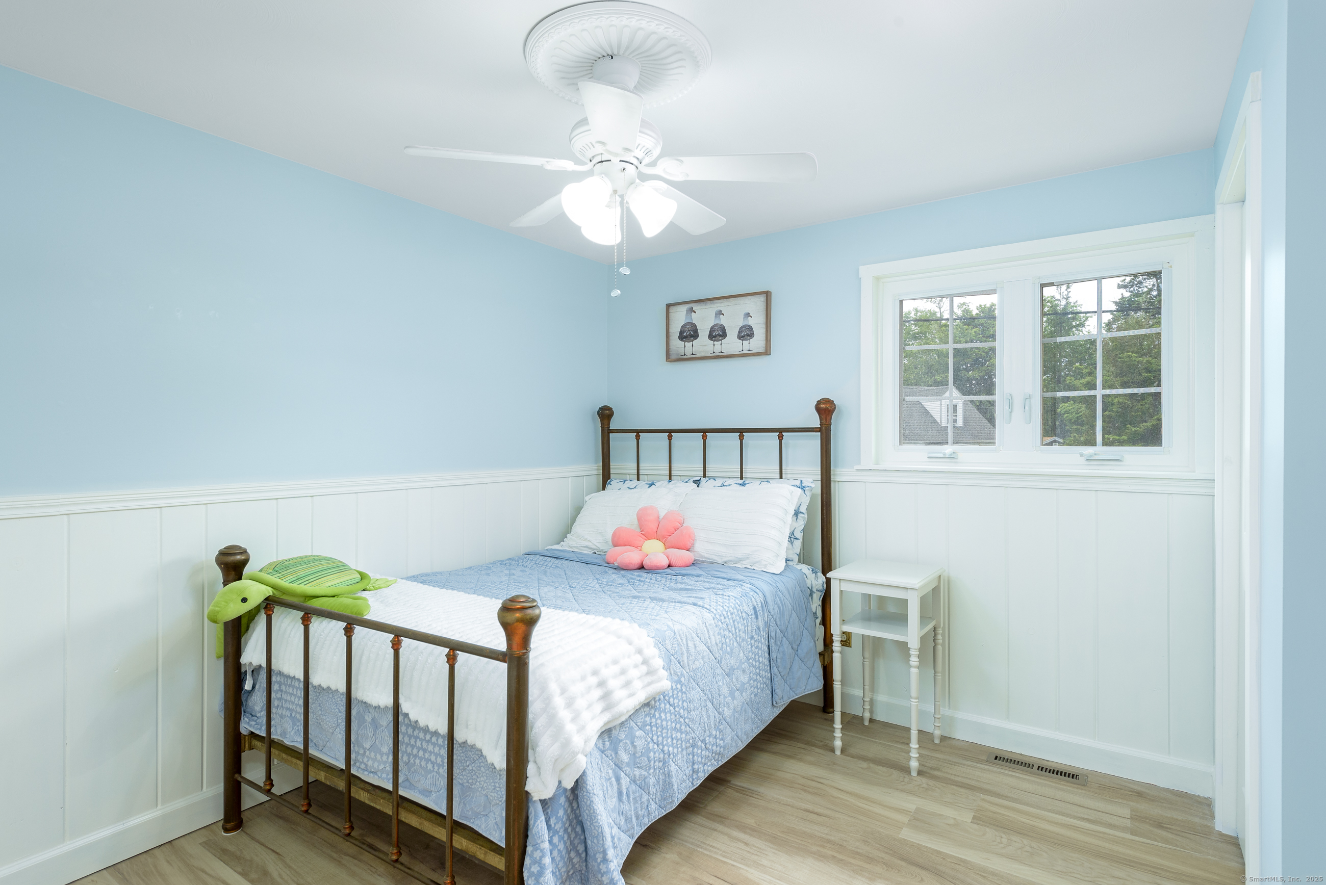 92 Grove Beach Road South Westbrook, CT 06498 - Photo 15 of 29 a bedroom with a bed and a window