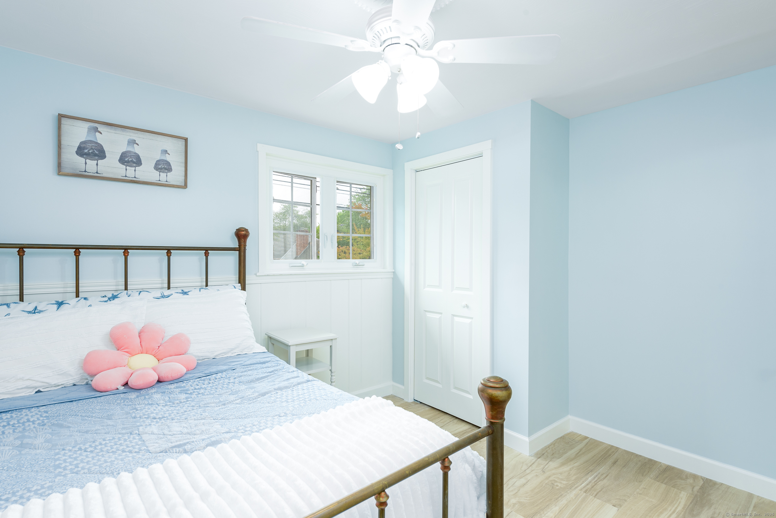 92 Grove Beach Road South Westbrook, CT 06498 - Photo 16 of 29 a bedroom with a bed and a window