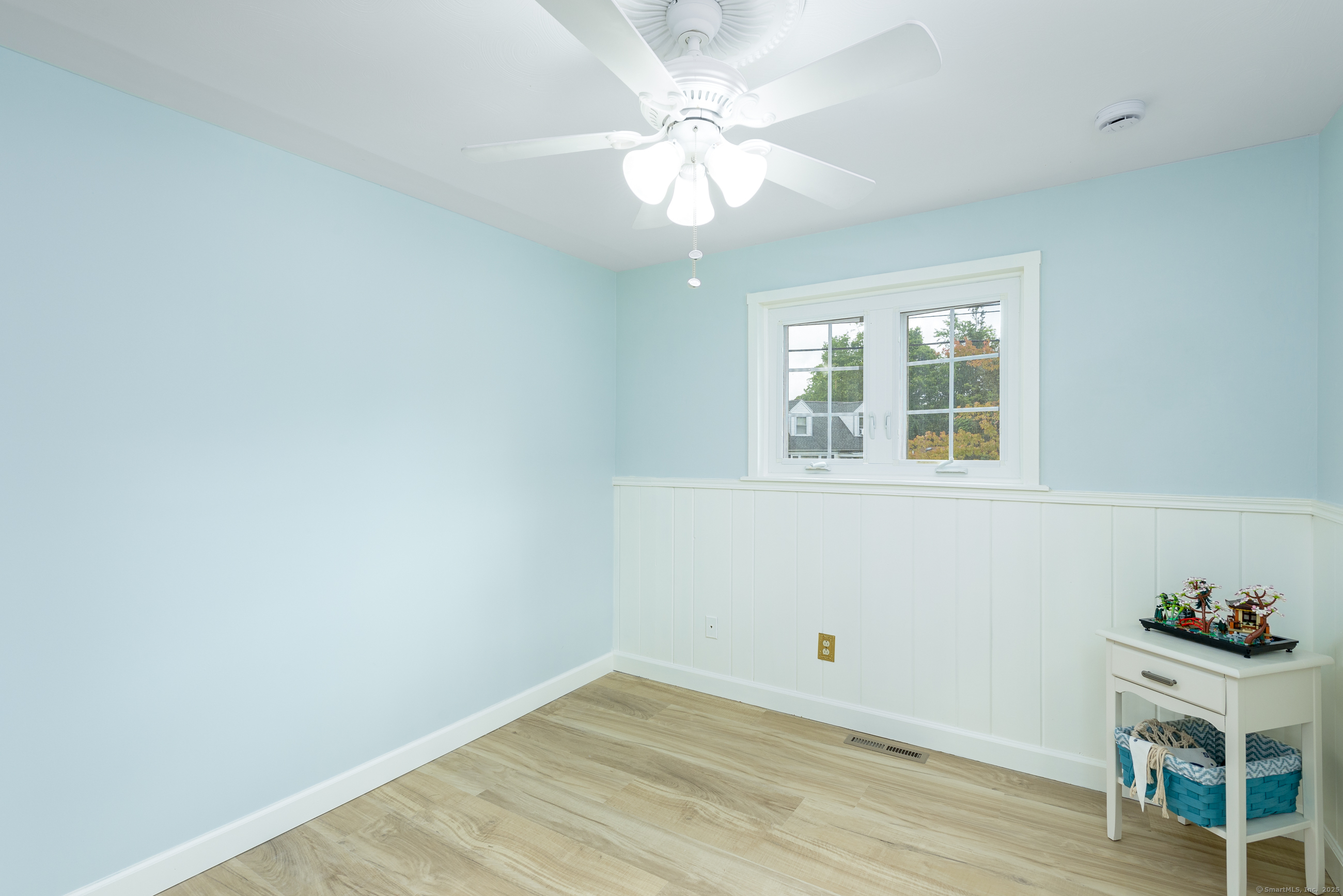 92 Grove Beach Road South Westbrook, CT 06498 - Photo 18 of 29 wooden floor in an empty room with a window