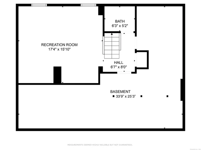 a view of an empty room with a fireplace