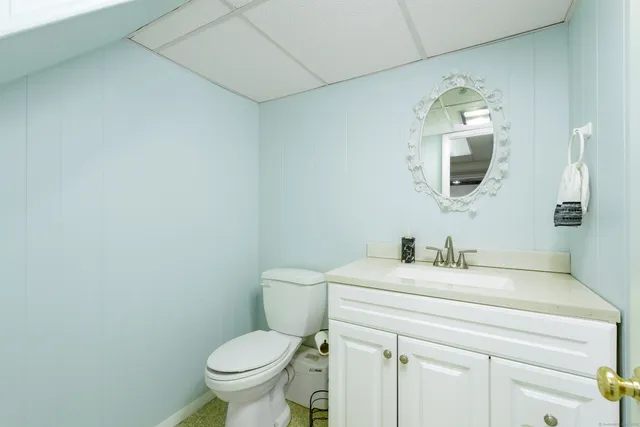 a view of an empty room with a ceiling fan