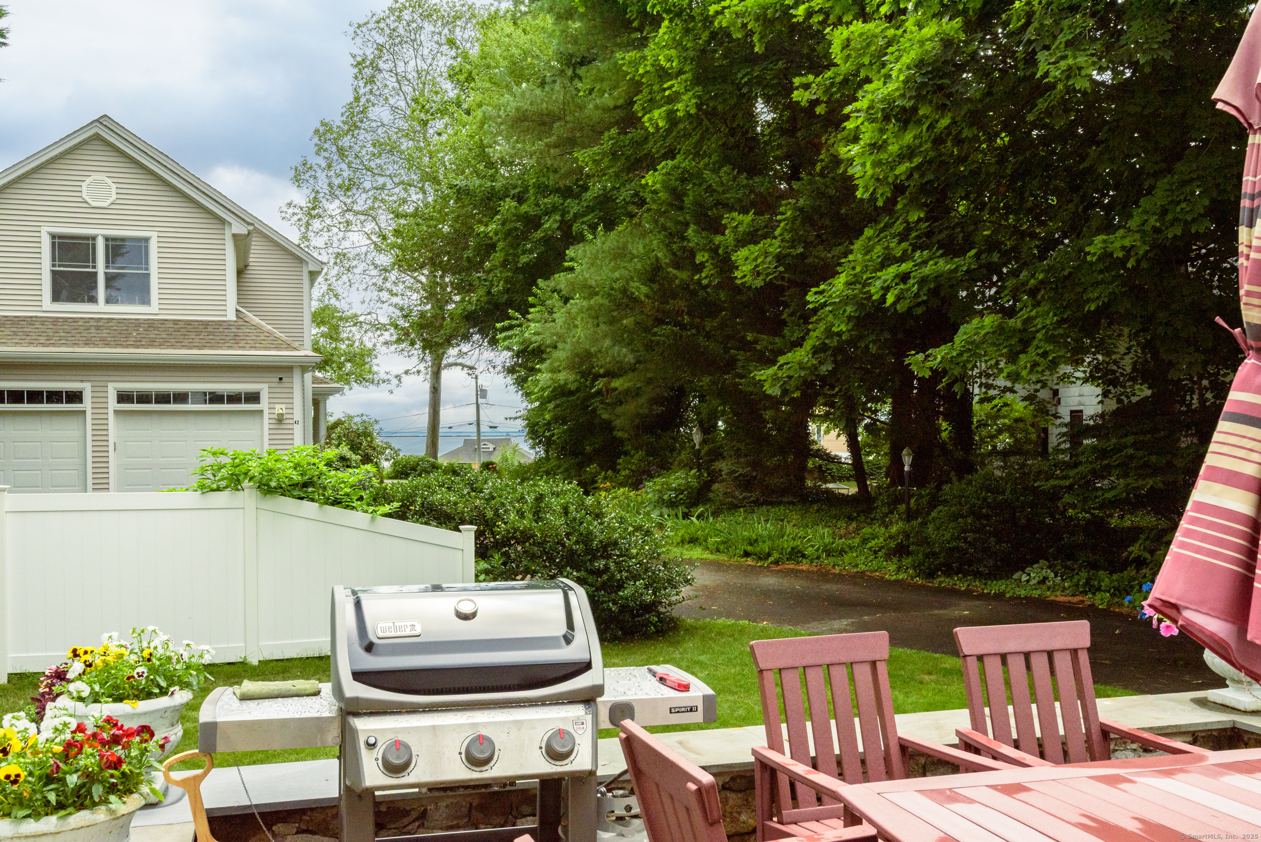 92 Grove Beach Road South Westbrook, CT 06498 - Photo 5 of 29 a front view of a house with a yard