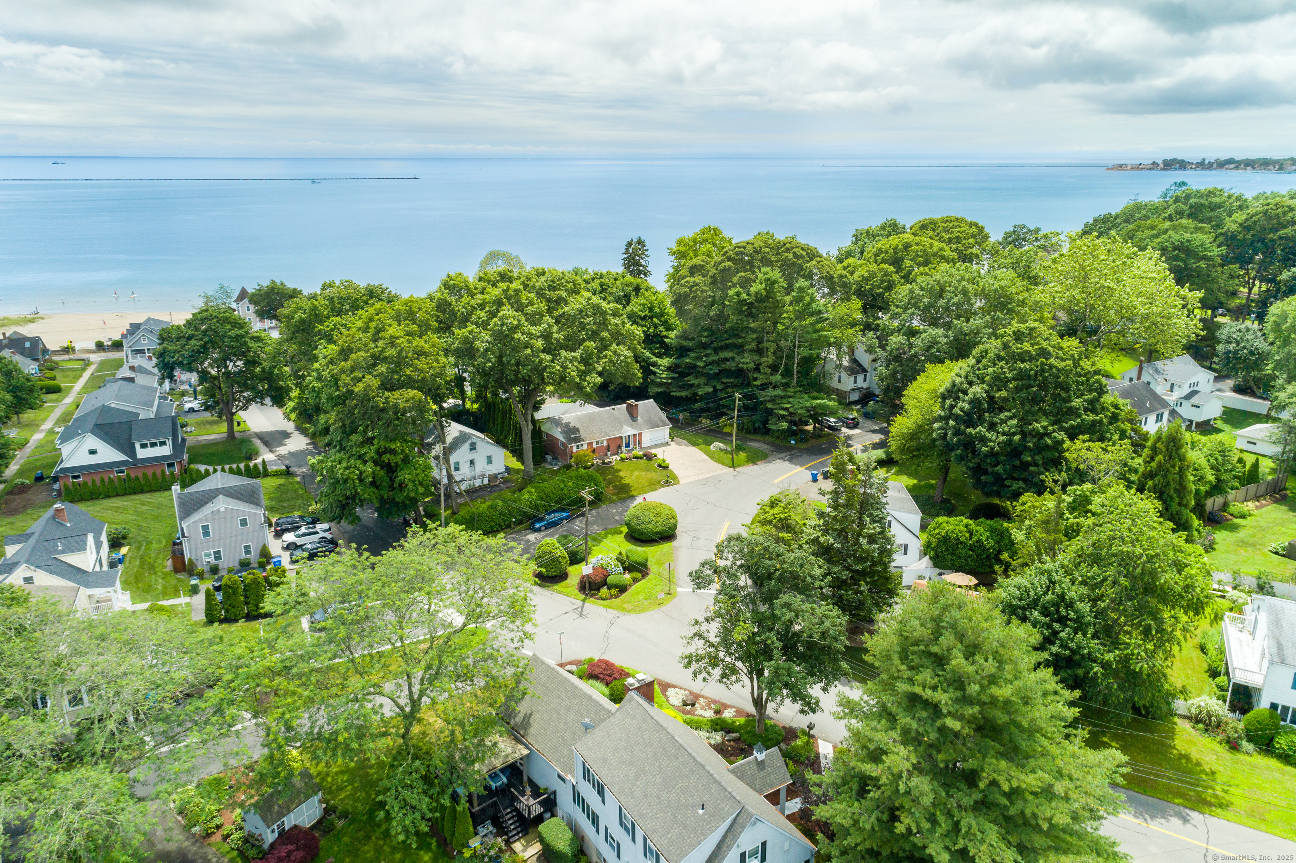 92 Grove Beach Road South Westbrook, CT 06498 - Photo 8 of 29 a view of a garden with lawn chairs