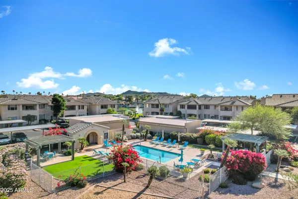 a view of a terrace with furniture and garden