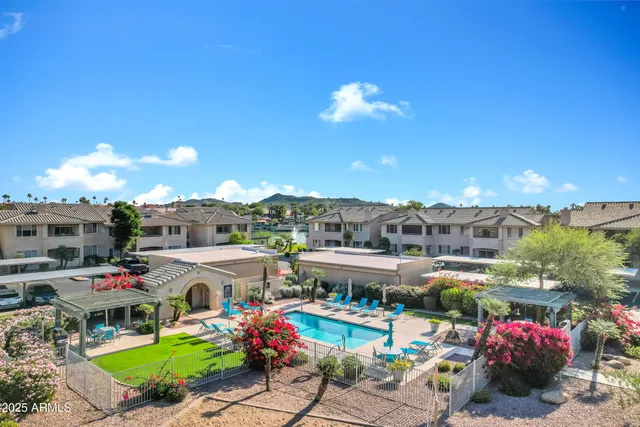 a view of a terrace with furniture and garden