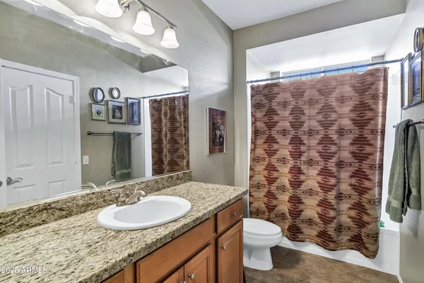 a view of roof deck with table and chairs