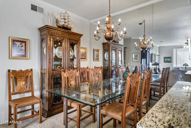 a view of a hallway with closet and a window