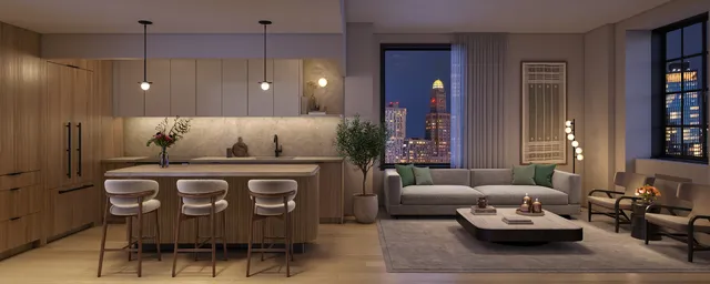 a living room with furniture and a ceiling fan