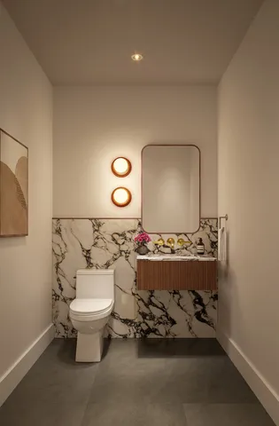 a room with furniture and mirror