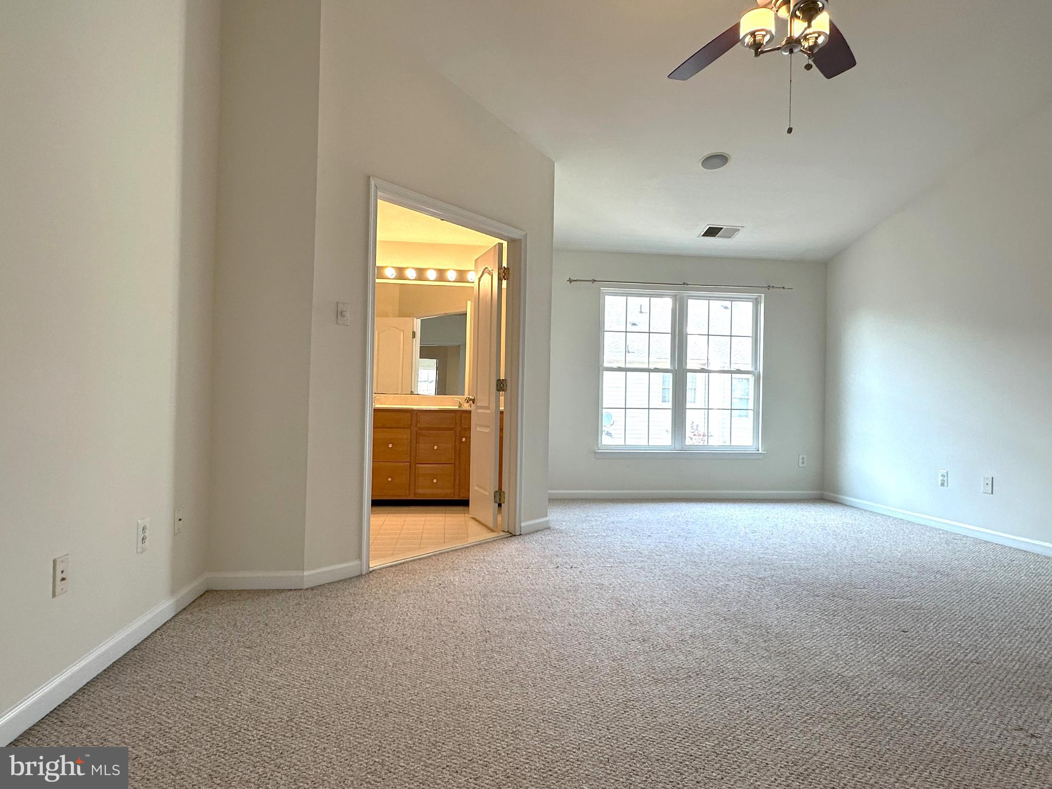 42756 Locklear Terrace Chantilly, VA 20152 - Photo 4 of 43 an empty room with a empty space and windows