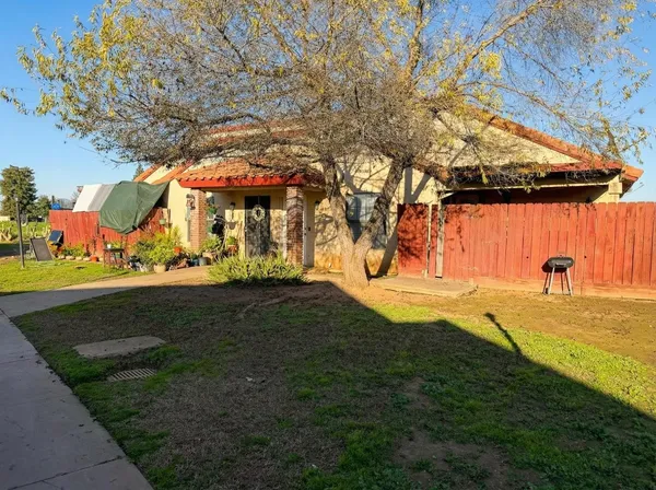 a view of yard with swimming pool