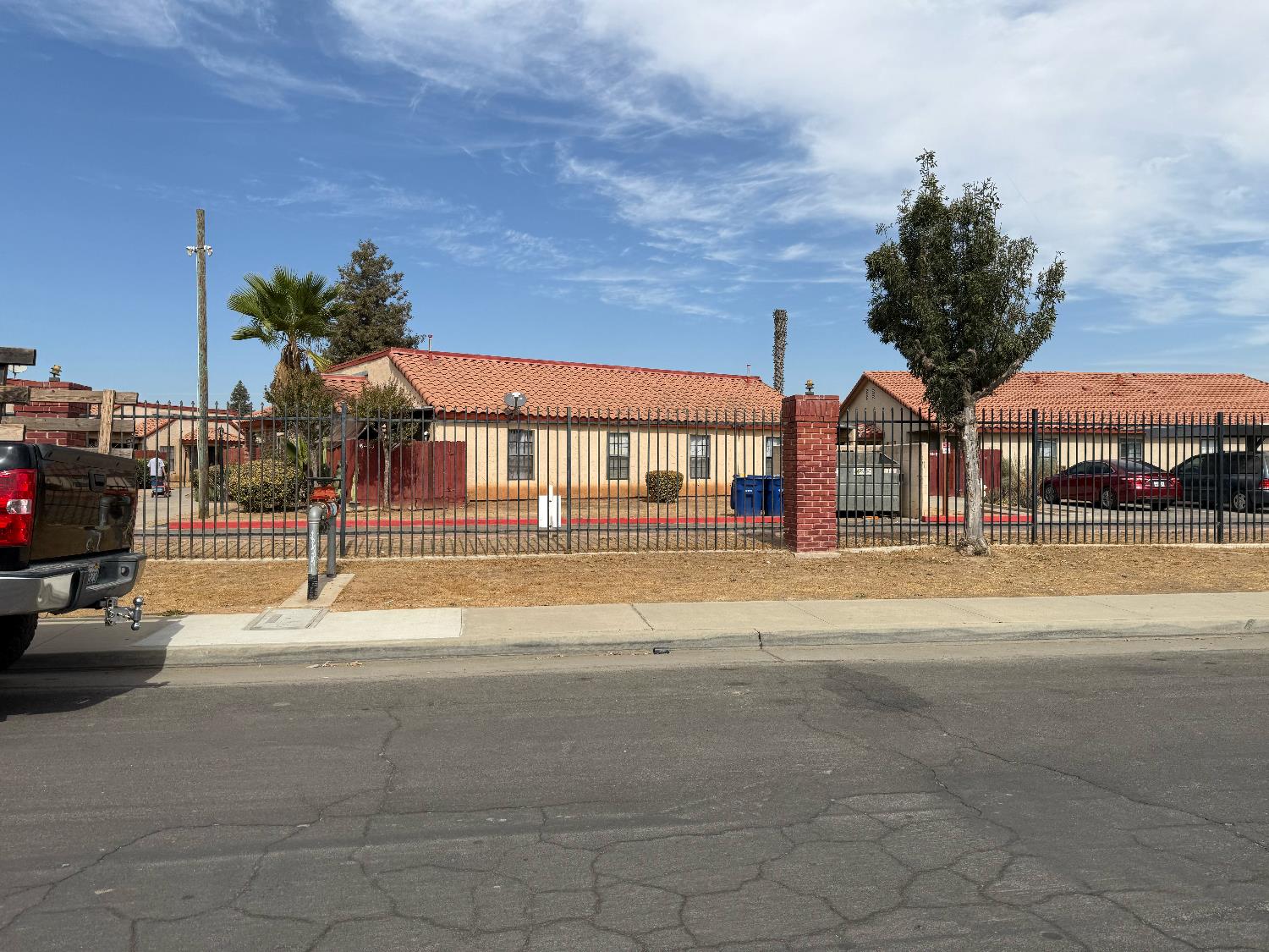 1405 East Cypress Avenue, Unit 137 Reedley, CA 93654 - Photo 4 of 15 a view of street with houses