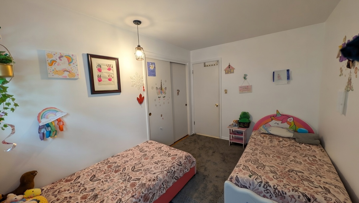 232 Kilpatrick Avenue Wilmette, IL 60091 - Photo 22 of 41 a bedroom with bed and wooden floor