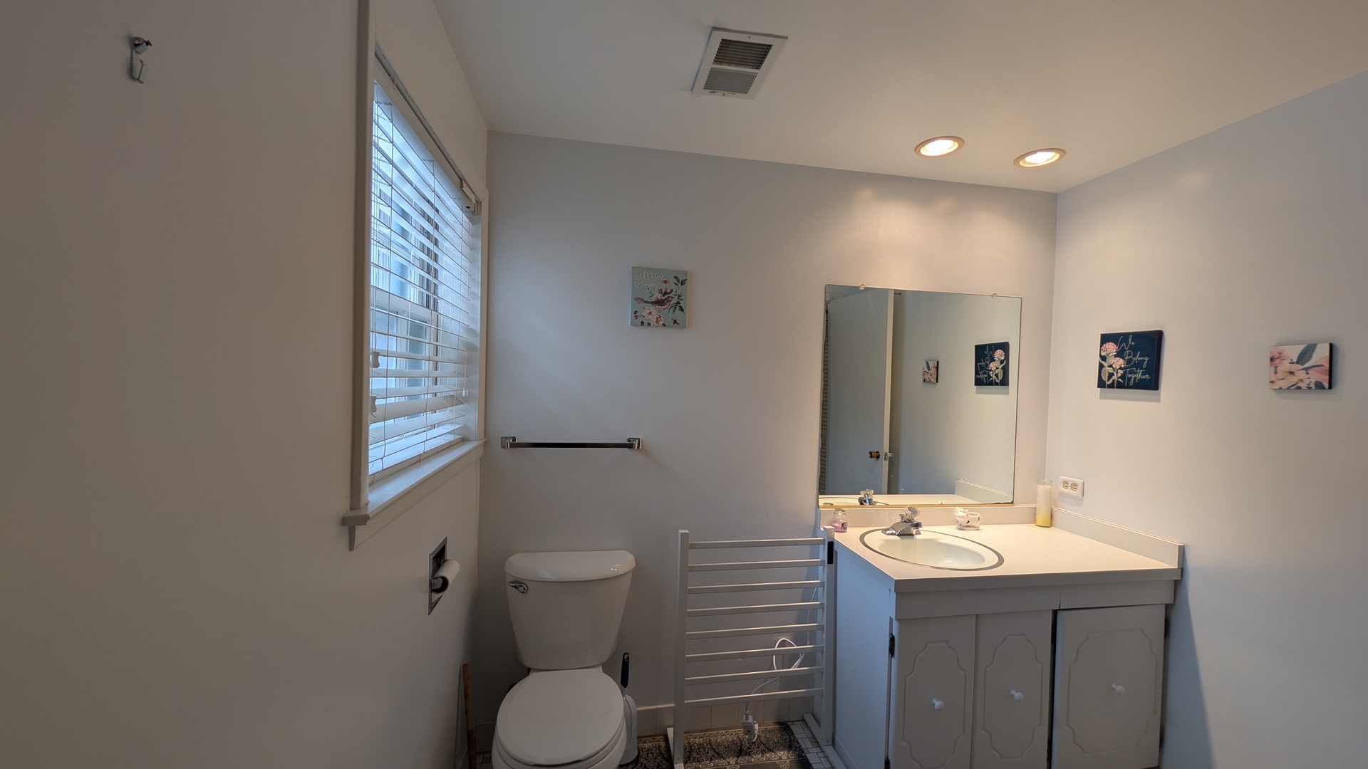 232 Kilpatrick Avenue Wilmette, IL 60091 - Photo 23 of 41 a bathroom with a sink toilet and mirror
