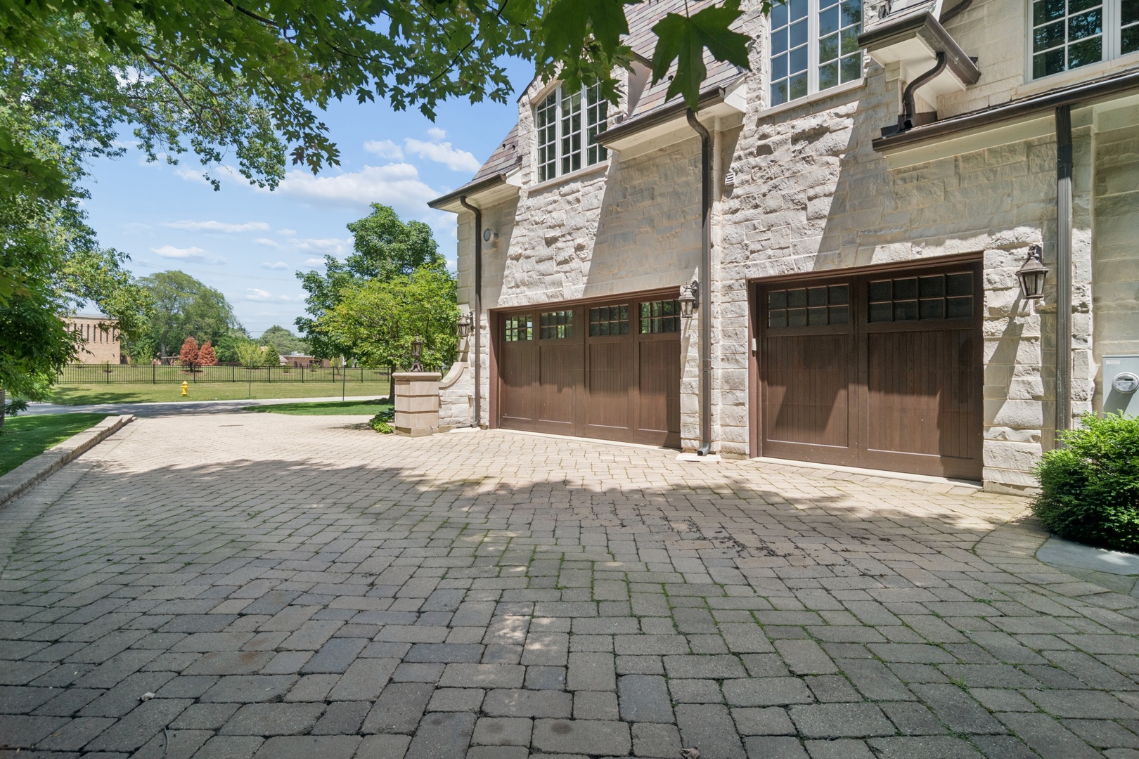 1128 Mt Pleasant Road Winnetka, IL 60093 - Photo 53 of 58 a view of a building with a yard and plants