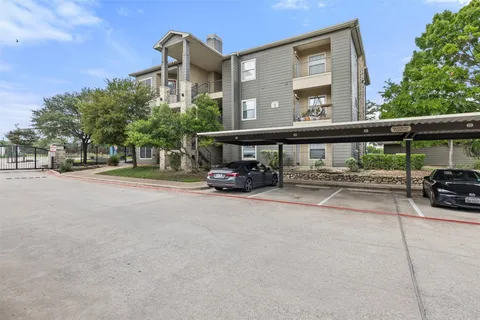 a car parked in front of a building
