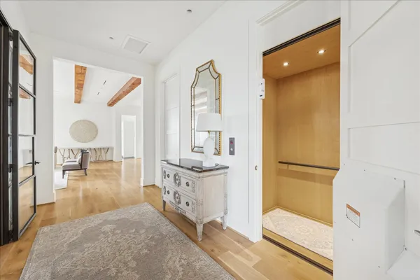 workspace with wooden floor cabinet and windows