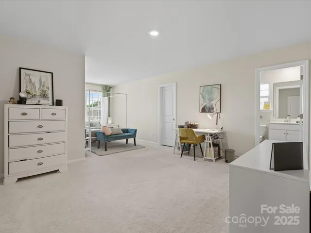a view of living room with furniture and window