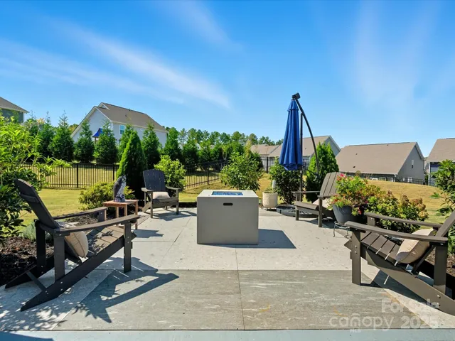 a view of a terrace with sitting area