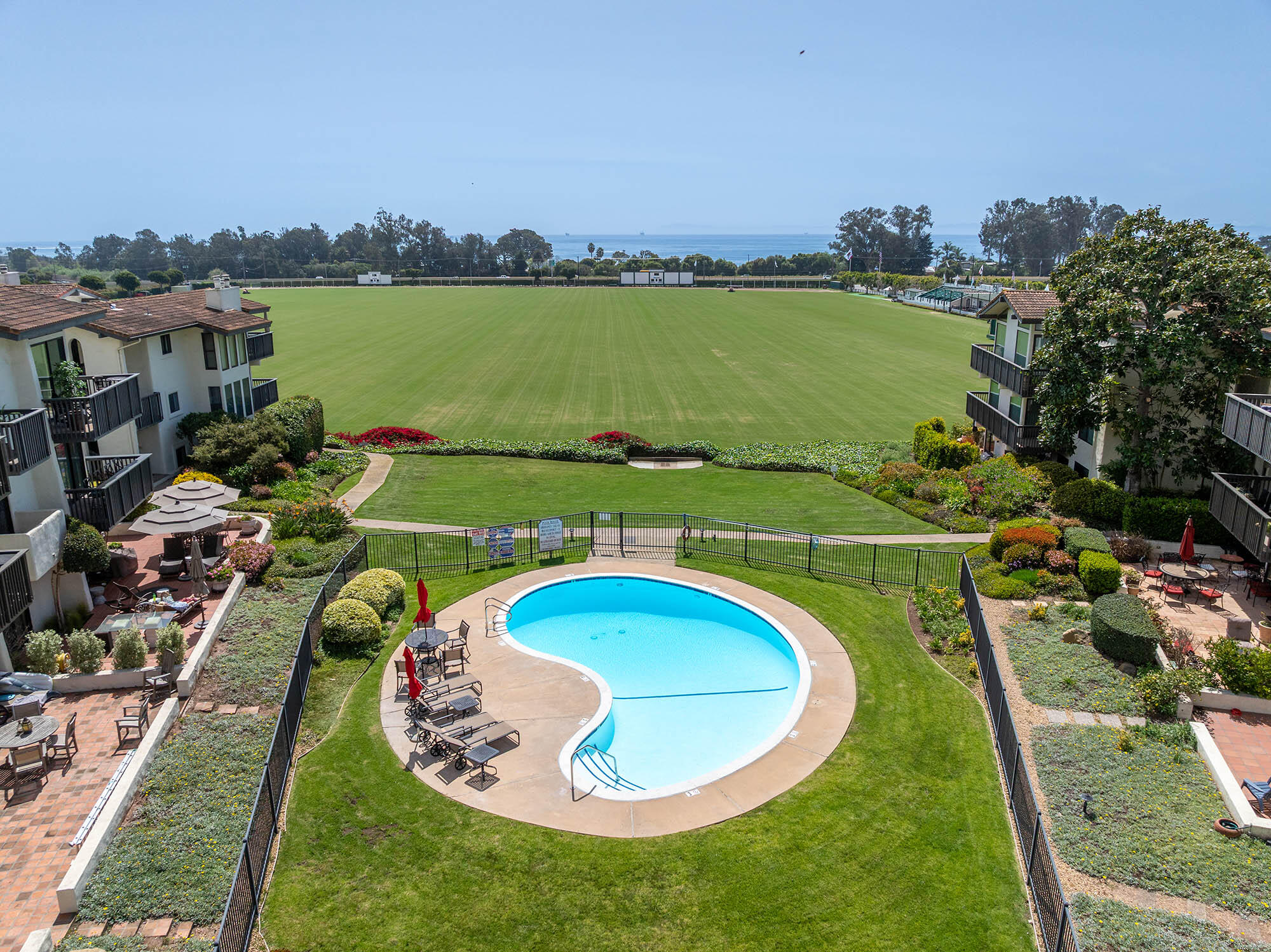 3375 Foothill Road, Unit 422 Carpinteria, CA 93013 - Photo 7 of 47 Aerial community pool - 3375 Foothill Rd