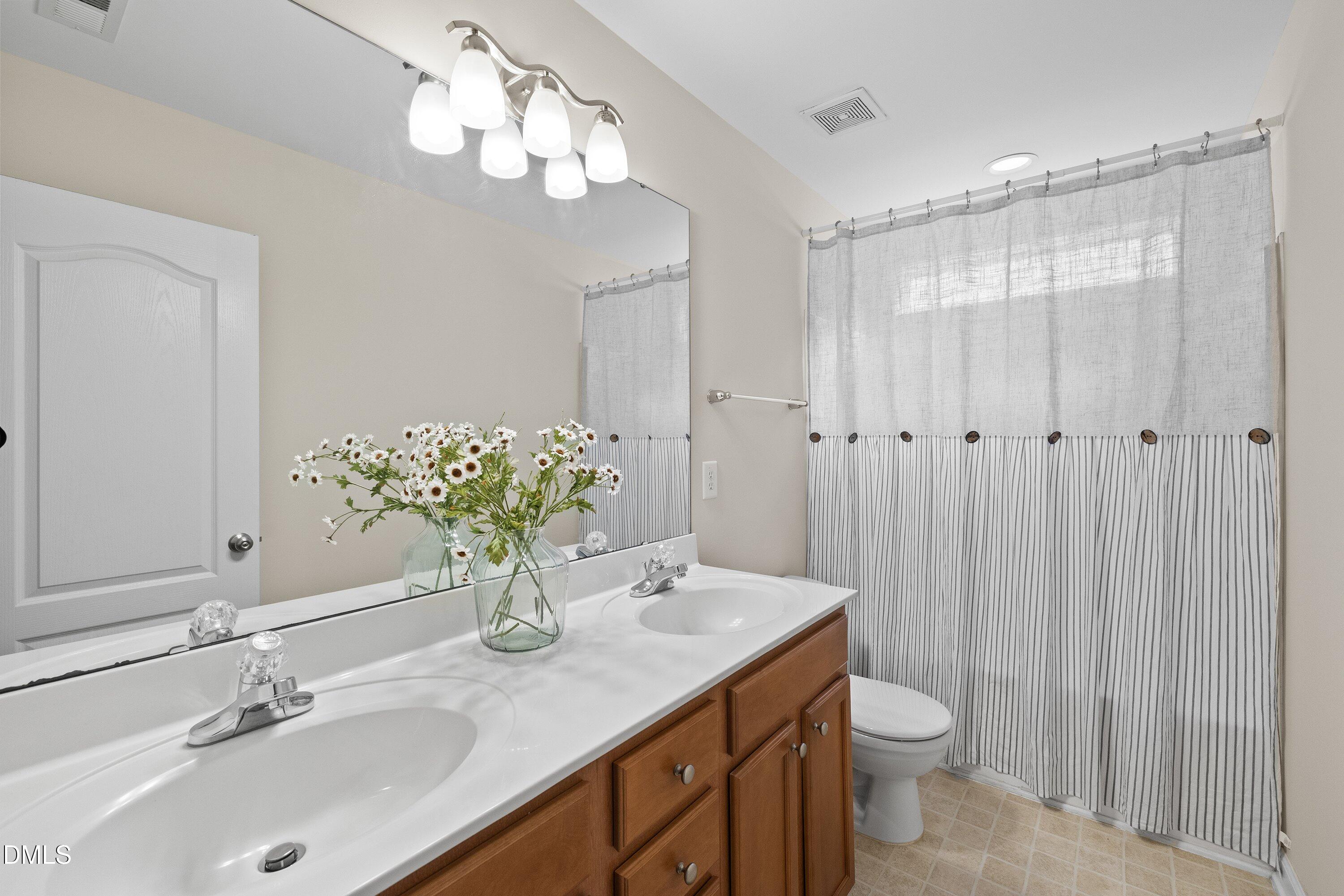 3414 Sunbright Lane Raleigh, NC 27610 - Photo 20 of 32 Full upstairs Bathroom