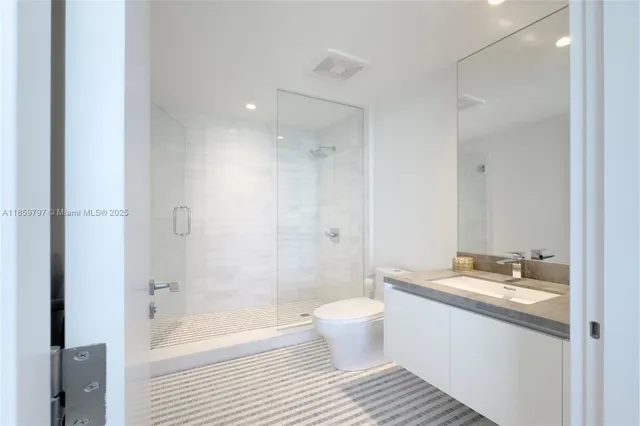 a bathroom with a bathtub and a sink