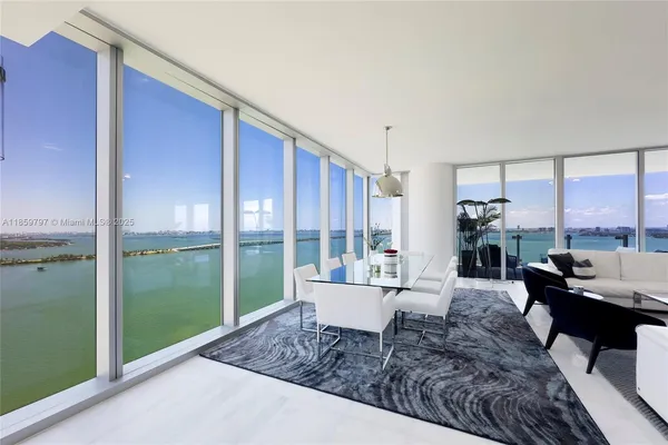 a room with furniture and a flat screen tv